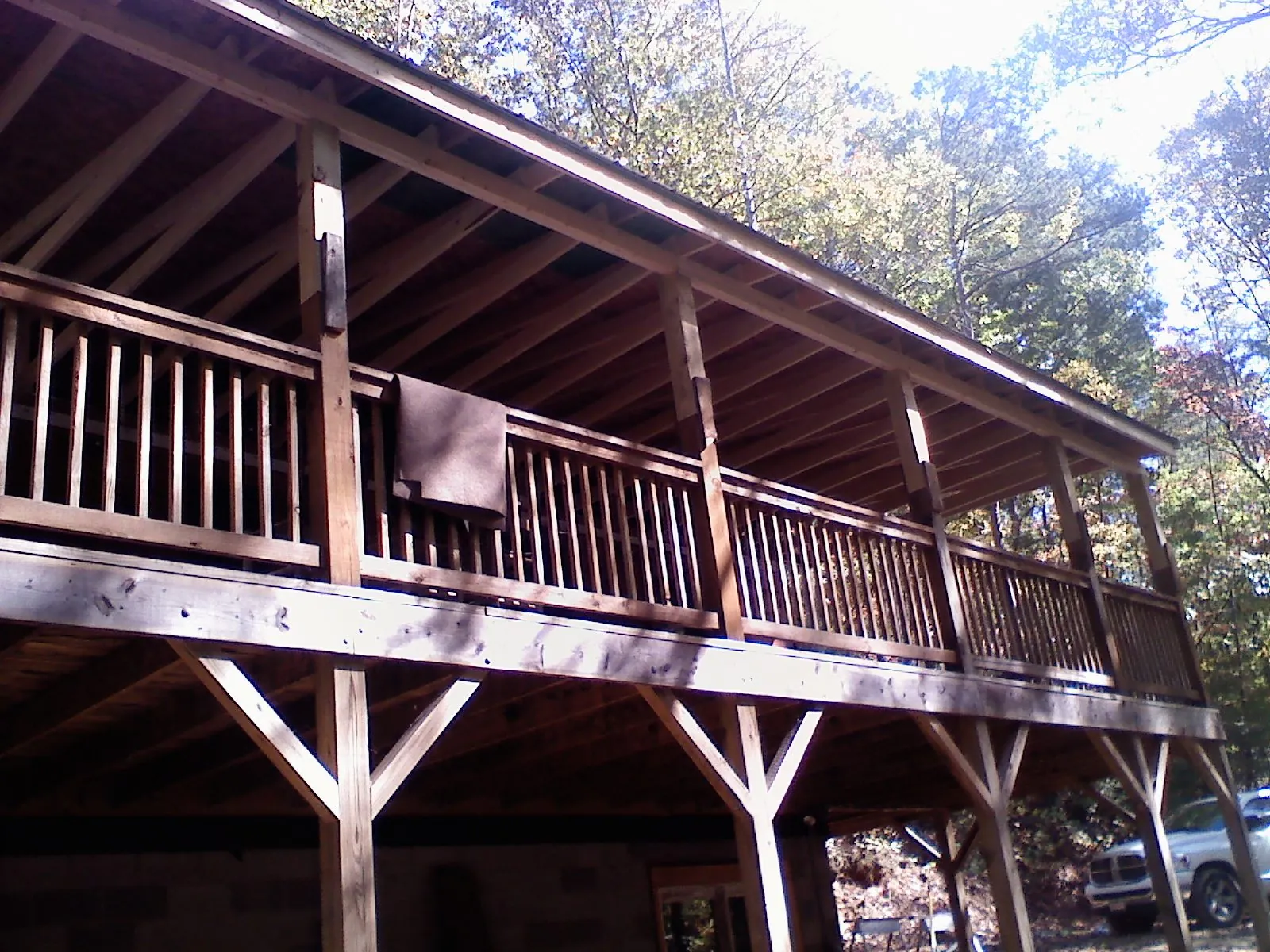 Timber framing under a new elevated porch and deck — Roof Leak Repair in Lake Milton by Roofing Brothers